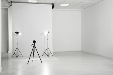 Photo studio interior with set of professional equipment