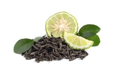 Pile of dry bergamot tea leaves and fresh fruit on white background