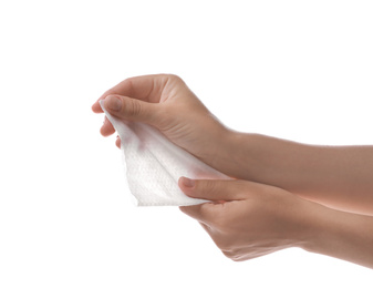 Woman holding wet wipe on white background, closeup
