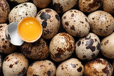 Fresh raw quail eggs as background, closeup
