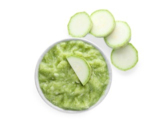 Delicious vegetable puree and zucchini slices on white background, top view. Healthy food