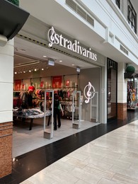 Photo of WARSAW, POLAND - JULY 13, 2022: Stradivarius clothing store in shopping mall