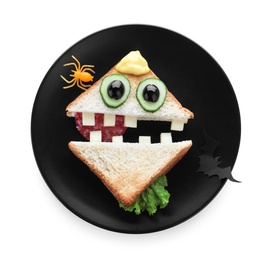 Cute monster sandwich on white background, top view. Halloween party food
