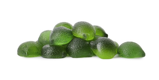 Pile of delicious gummy lime candies on white background
