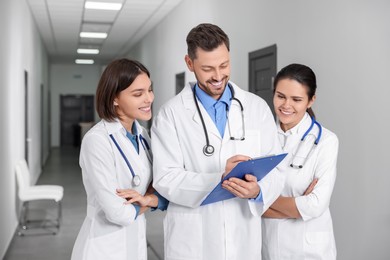 Photo of Team of medical students in college hallway