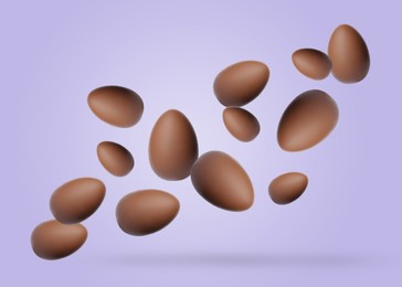 Image of Many chocolate eggs falling on pale violet background