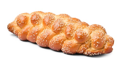 Homemade braided bread with sesame seeds isolated on white. Traditional Shabbat challah