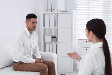 Photo of Man having appointment with STD specialist in clinic