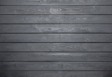 Texture of grey wooden surface as background, top view
