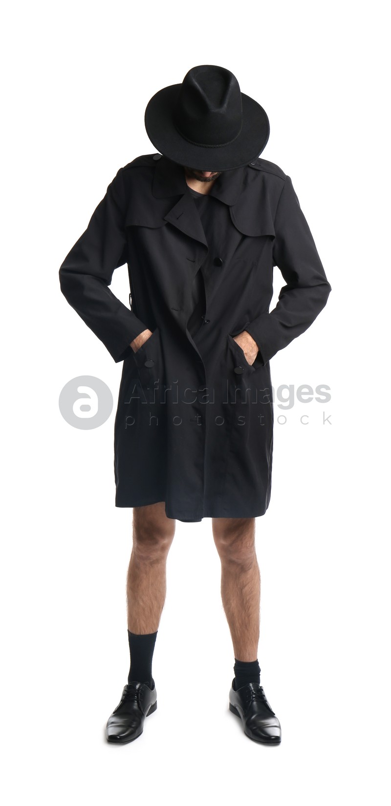 Photo of Exhibitionist in coat and hat isolated on white
