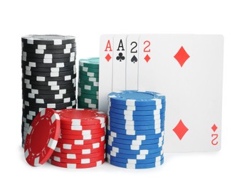 Playing cards and plastic casino chips on white background. Poker game
