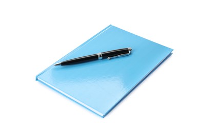 Light blue planner with pen isolated on white