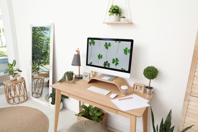 Stylish room interior with comfortable workplace. Home office