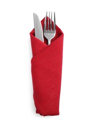 Fork and knife wrapped in red napkin on white background, top view