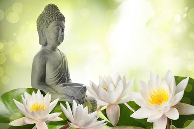 Beautiful stone Buddha sculpture and lotus flowers on color background