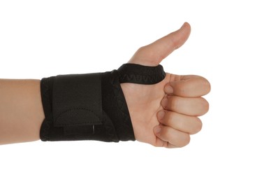 Woman with hand wrapped in medical bandage showing thumb up on white background, closeup