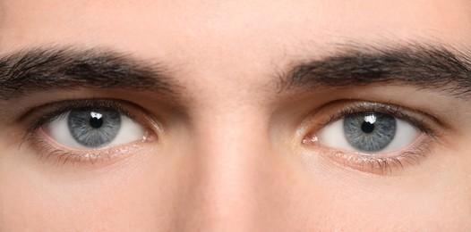 Image of Closeup view of man with beautiful eyes. Banner design