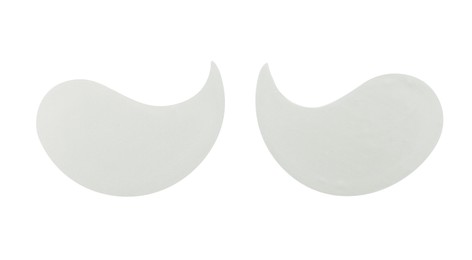 Photo of Under eye patches on white background, top view. Cosmetic product