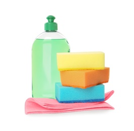 Cleaning supplies and sponges for dish washing on white background