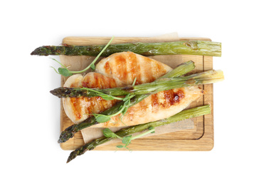 Tasty grilled chicken fillet with asparagus and sprouts isolated on white, top view