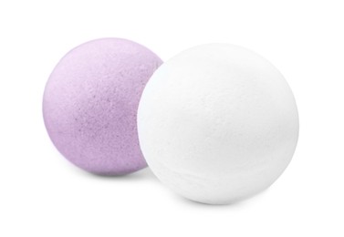 Two colorful bath bombs on white background