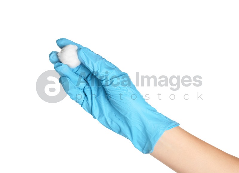 Doctor in sterile glove holding medical cotton ball on white background
