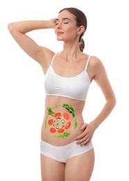 Slim young woman and images of vegetables on her belly against white background. Healthy eating