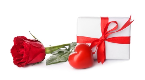 Beautiful gift box, rose and red heart on white background. Valentine's day celebration