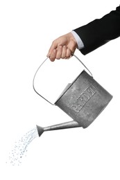 Businessman pouring water from can on white background, closeup