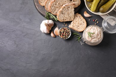 Photo of Delicious lard spread on black table, flat lay. Space for text