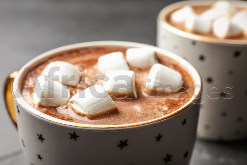 Cup of delicious hot cocoa with marshmallows, closeup