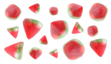 Image of Tasty watermelon gummy candies falling on white background. Jelly sweet