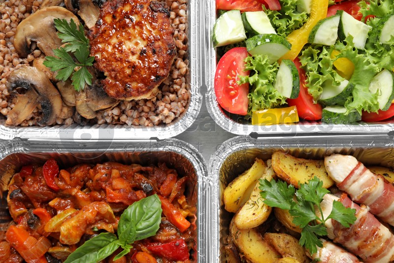 Lunchboxes on table, flat lay. Healthy food delivery