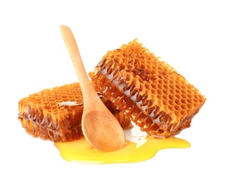 Fresh honeycombs and spoon on white background