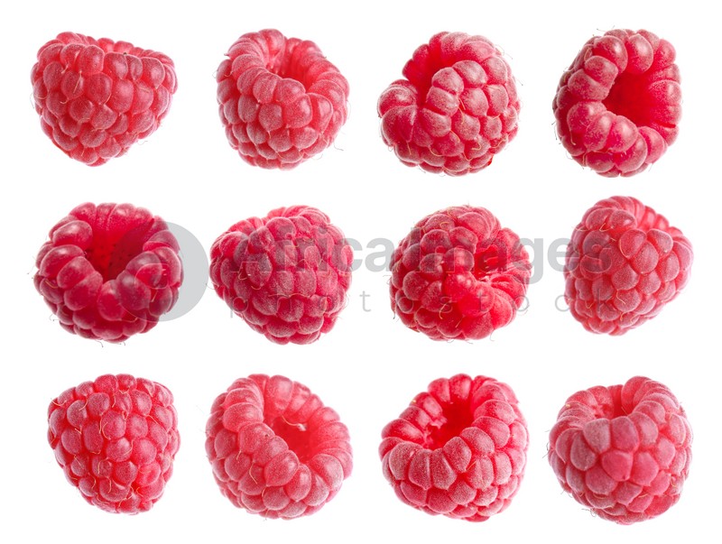 Set with delicious ripe raspberries on white background