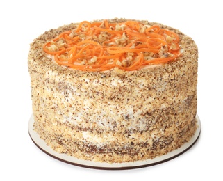 Dish with delicious carrot cake on white background