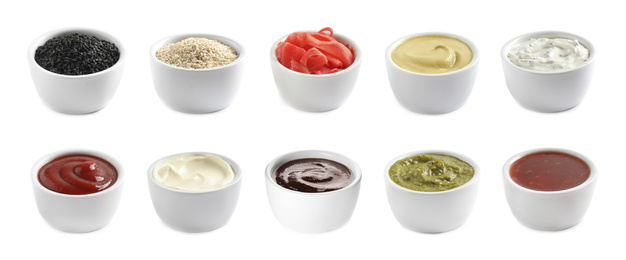 Set of different delicious sauces and condiments on white background. Banner design