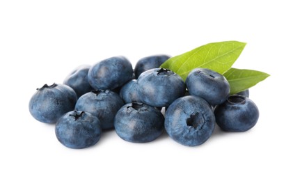 Pile of tasty fresh ripe blueberries and green leaves on white background