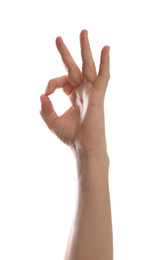 Man showing okay gesture against white background, closeup of hand