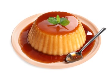 Photo of Delicious pudding with caramel and mint isolated on white