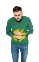 Young man suffering from digestive disorder and bacteria illustration on white background. Food poisoning