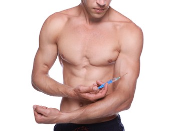 Athletic man injecting himself on white background, closeup. Doping concept