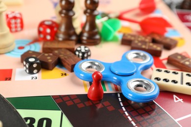 Different types of board games as background, closeup