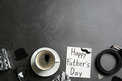 Flat lay composition with greeting card on grey background, space for text. Happy Father's Day