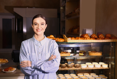 Photo of Portrait of female business owner in bakery
