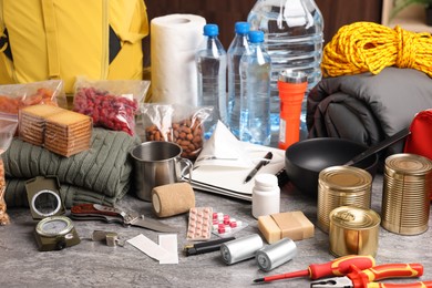 Disaster supply kit for earthquake on grey table
