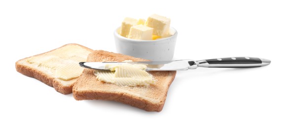 Tasty toasts with butter and knife on white background