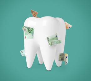 Model of tooth with dollar banknotes on teal background. Concept of expensive dental procedures