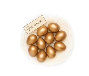 Golden eggs and card with word Retirement in nest on white background, top view. Pension concept