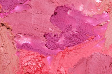 Texture of beautiful lipsticks as background, closeup